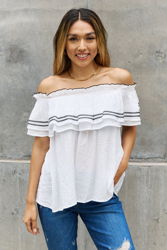 Ruffle Off-the-Shoulder Blouse with Contrasting Embroidery Detail